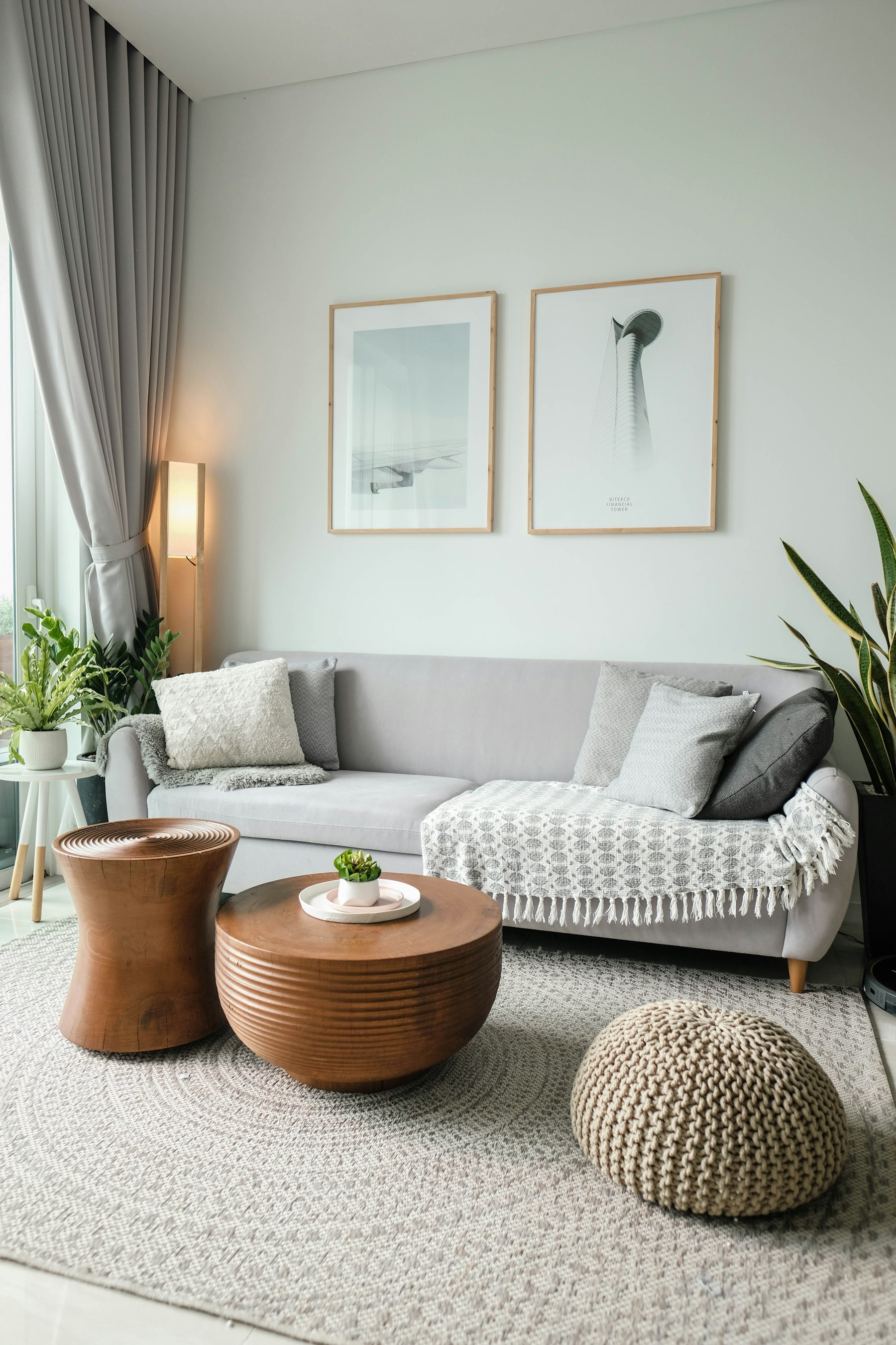 Layered room with oak furniture, soft upholstery, and generous breathing room